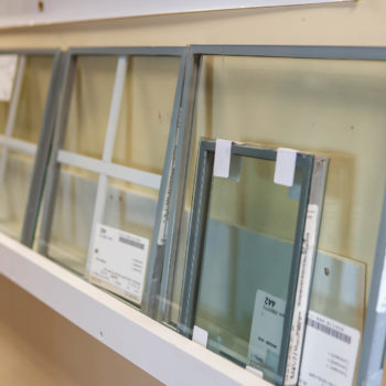 A row of windows on a shelf.