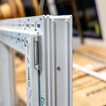 A close up of a window frame in a factory.