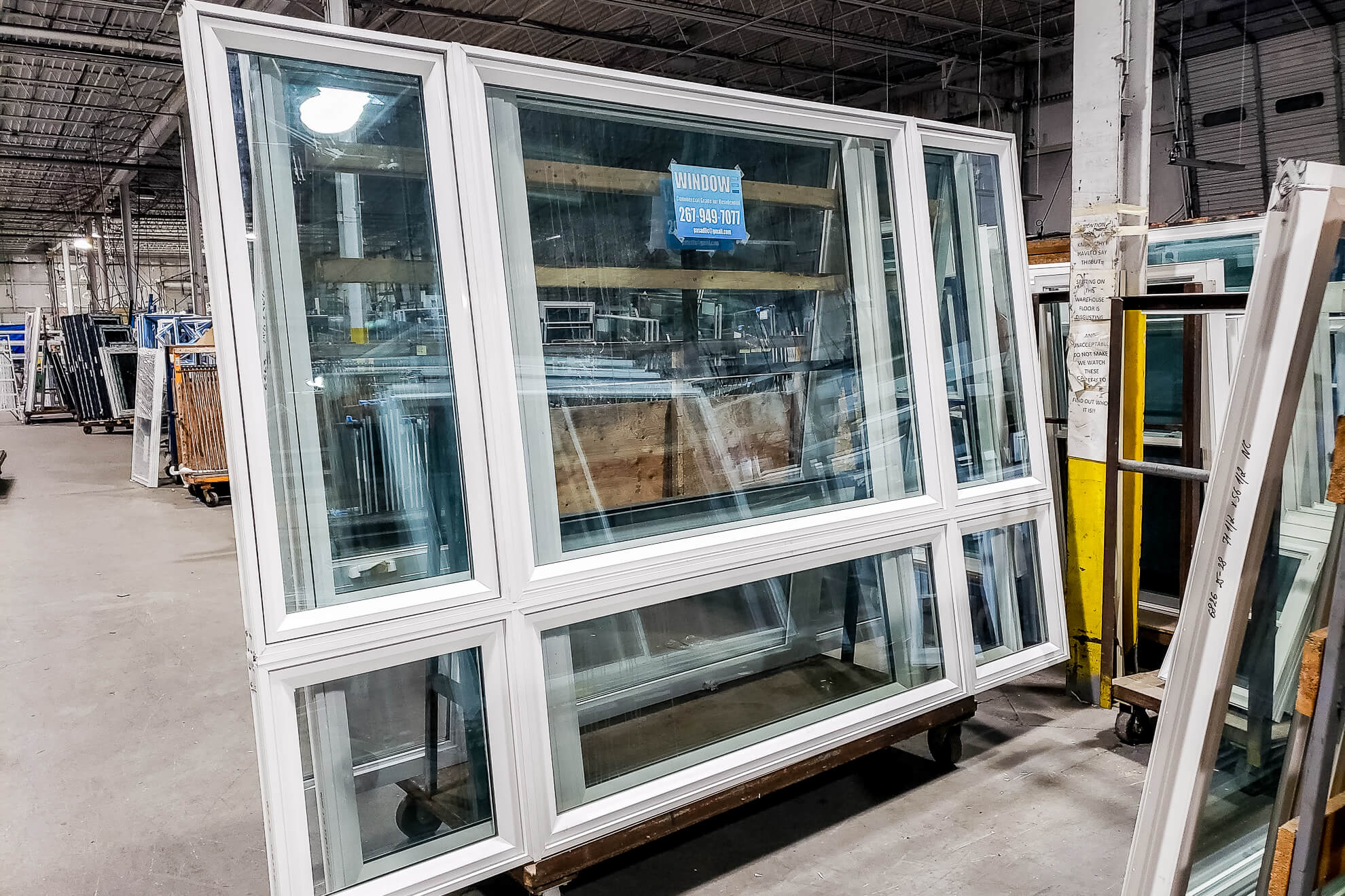 A large warehouse full of windows and doors, perfect for your next project.